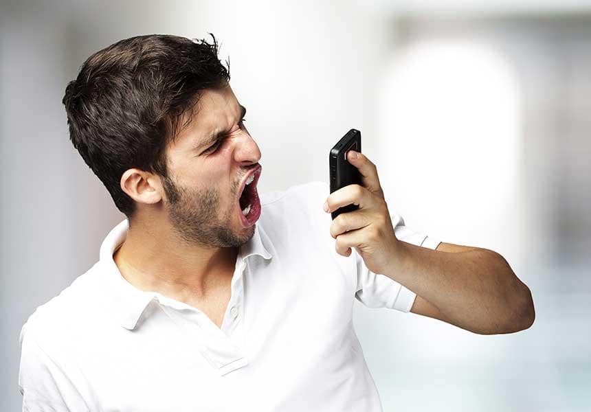 Gambler shouting at his smartphone